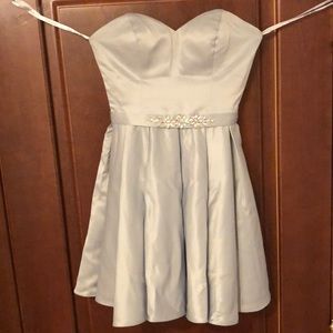 Short silver fit and flare dress from Star Box